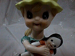 Ceramic Girl Holding a Doll.JPG (28873 bytes)