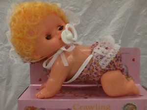 vintage crawling baby doll